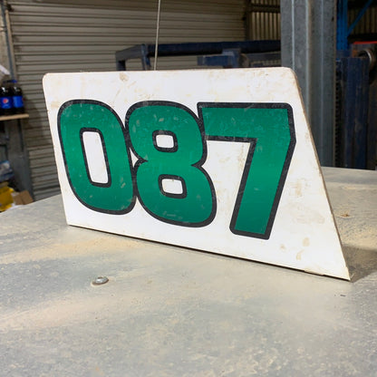 Shark fin number plate